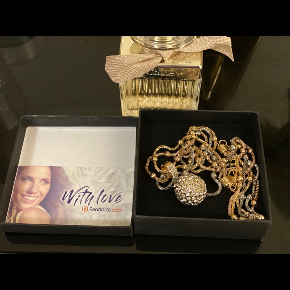 pandora box gold and silver necklace.
